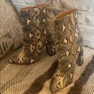 Snakeskin high heel booties